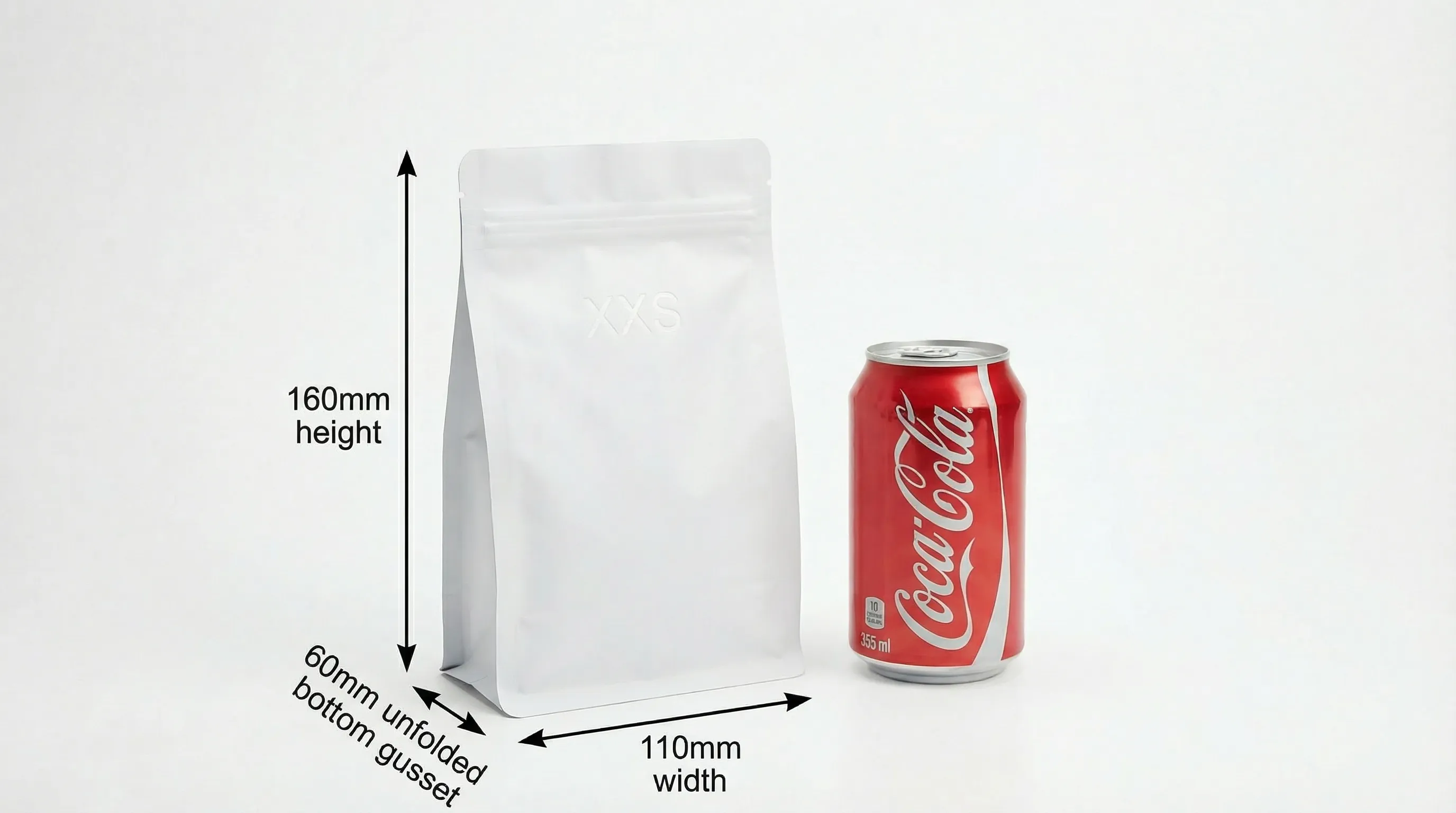 Flat bottom bag size XXS compared to cola can