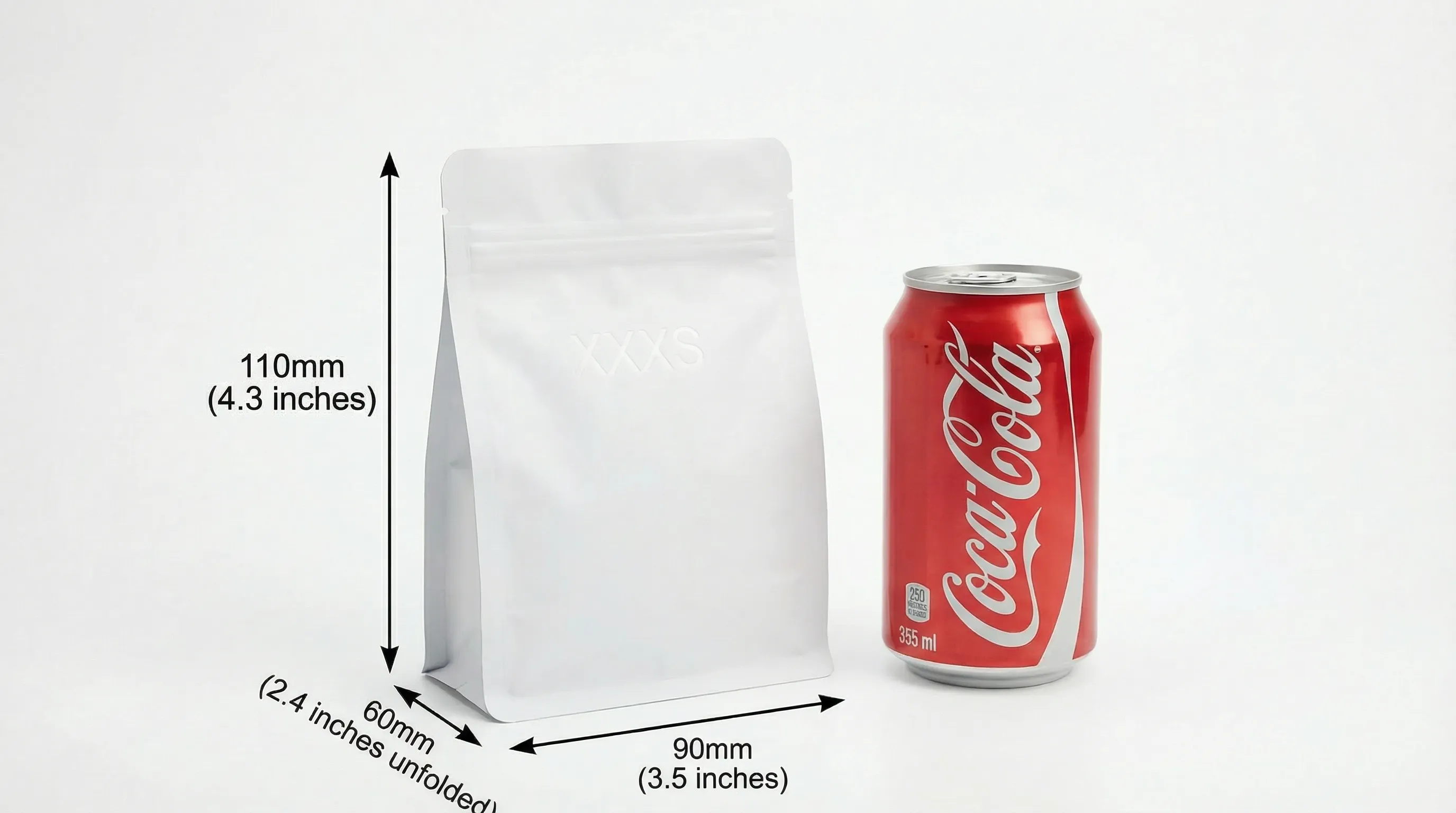 Flat bottom bag size XXXS compared to cola can